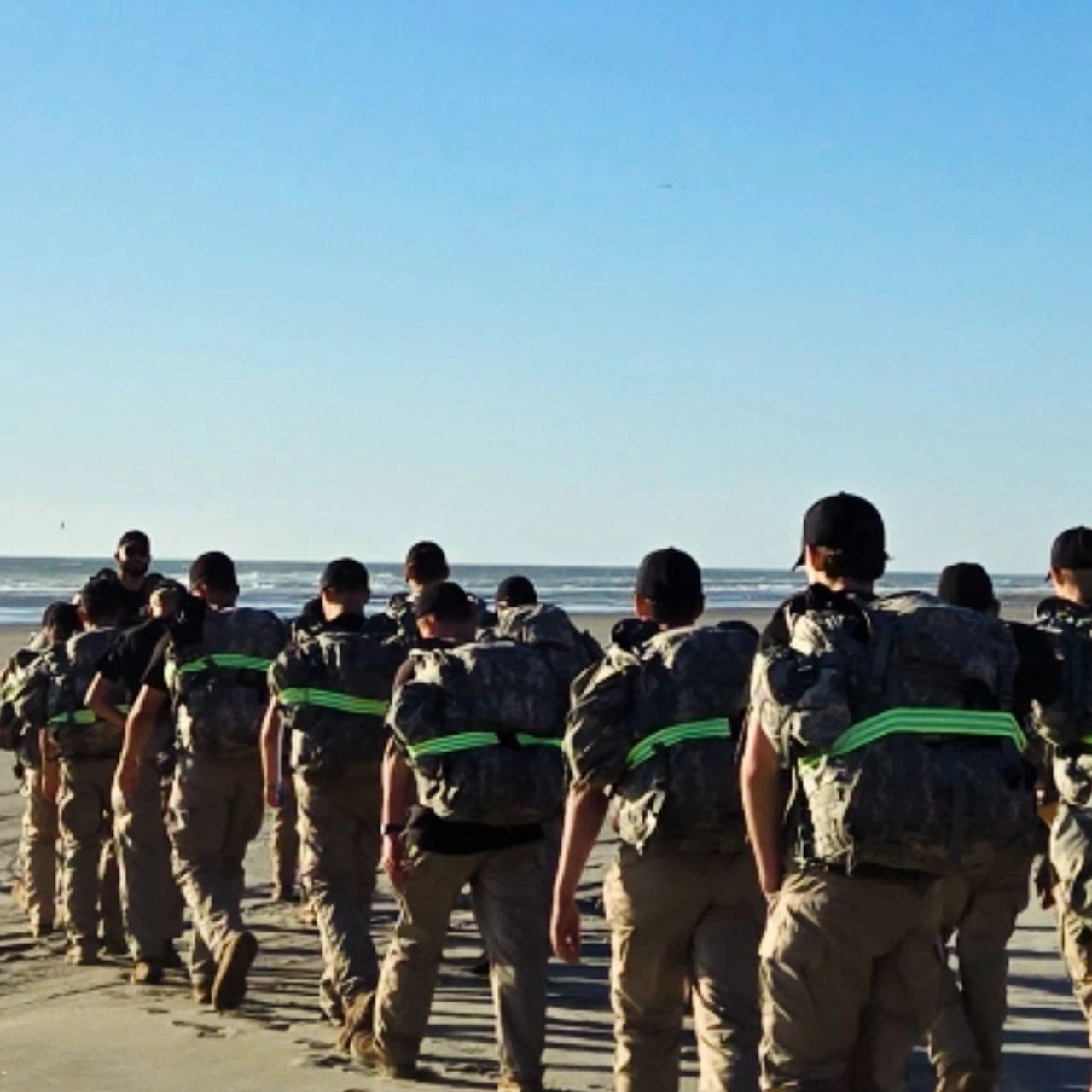 Military training group on beach